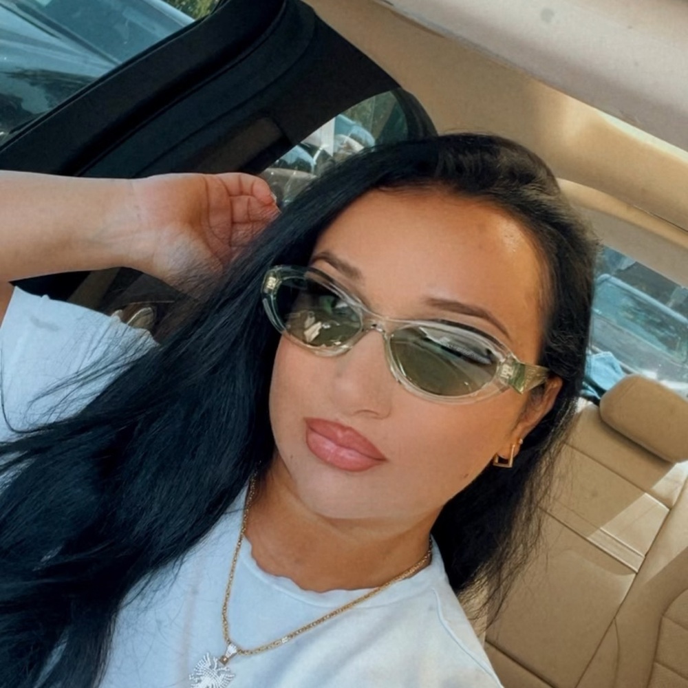 Prada Clear Green Cat-Eye Sunglasses